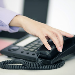 Hand am Telefon