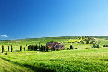 Tuscany landscape with typical farm house