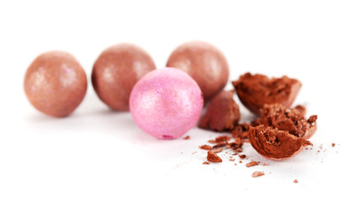 powder balls isolated on white.