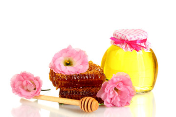 sweet honeycombs and jars with honey isolated on white