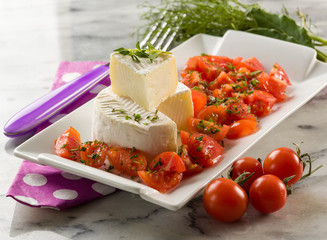 tomino cheese with pachino tomatoes salad