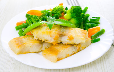 fried fish with vegetables
