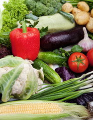 Fresh vegetables on white.