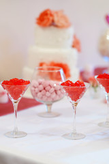 Two glasses of gummy hearts