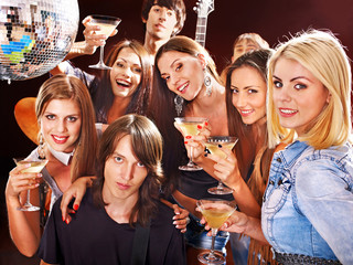 Woman on disco in night club.