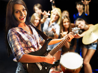 Obraz premium Band playing musical instrument.