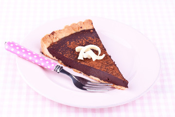 a slice of chocolate tart