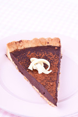a slice of chocolate tart