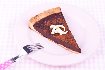 a slice of chocolate tart