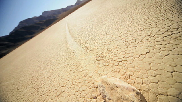 Arid Lake Bed Trail of Moving Rock