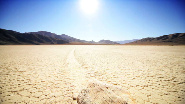 Arid Lake Bed Trail of Moving Rock