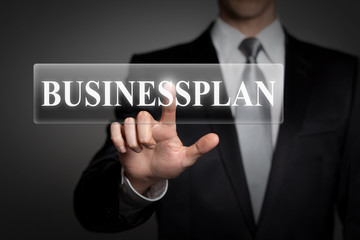 businessman pressing virtual button - businessplan