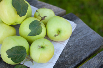 fresh apples on wooden table