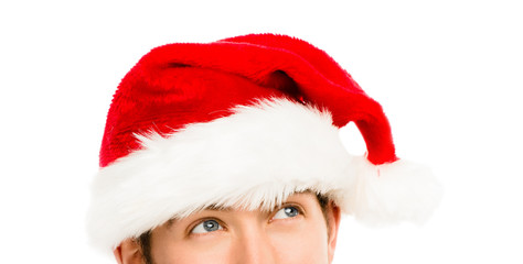 Closeup of cuacasian man wearing christmas hat for santa white