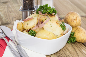 Bowl with fried Potatoes