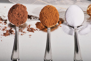 3 spoons with baking ingredients
