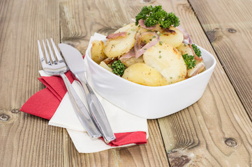 Bowl with fried Potatoes