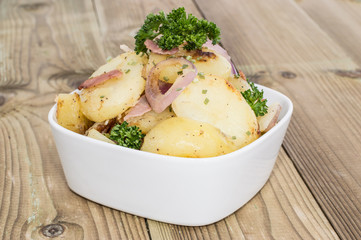 Bowl with fried Potatoes