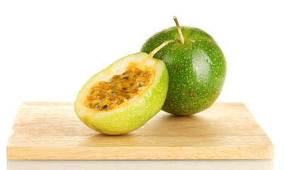 green passion fruit isolated on white background close-up