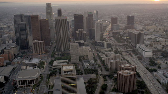 Aerial cityscape view of traffic, skyscrapers, LA, USA