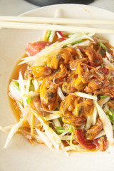 Spicy Green papaya salad with cockles