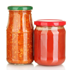 Jars with lecho and tomato paste isolated on white