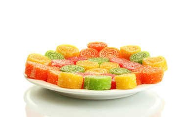 colorful jelly candies on plate isolated on white.