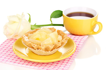 sweet cake with cup of tea isolated on white