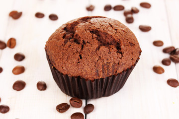 Fresh muffin on wooden background