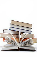 A stack of books on a white background.