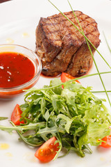 Grilled steak with sauce