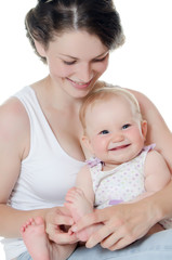 happy mother with baby over white