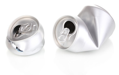 crumpled empty cans isolated on white.