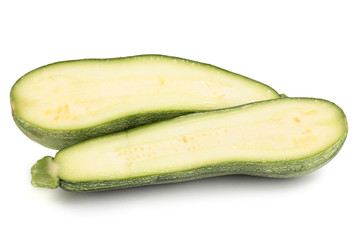 Halves of fresh zucchini isolated on white