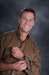 Handsome Man Posing For Studio Portrait in a jacket