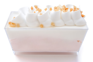 pink and white cake with peanut on top with clipping path