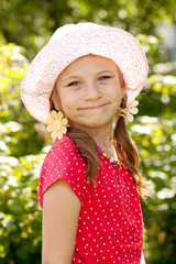 Smiling girl with pigtails