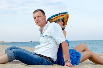 Couple using each other as backrests