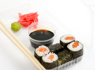 Traditional Japanese food Sushi. Sushi collection in plastic box