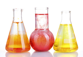 brightly ink in a flask with water isolated on white