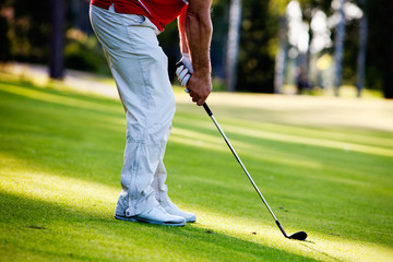 Man playing golf