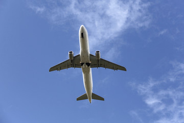 Airplane flying over highway