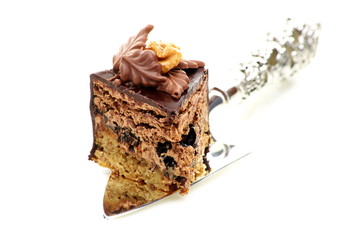 Piece of chocolate cake with prunes.