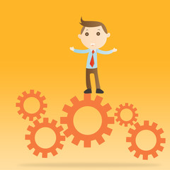 Businessman with engine on yellow background