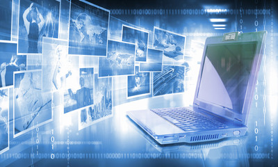 Notebook against colour background with images