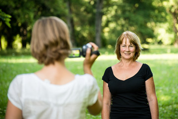 Woman is taking video of her mother
