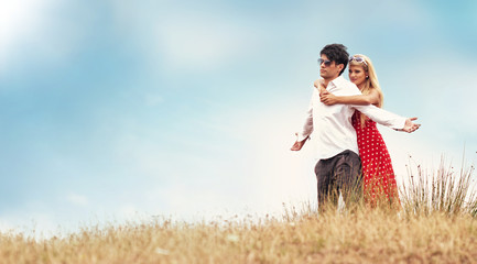 Portrait of flying happy beautiful couple