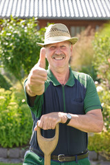 Fototapeta premium Gärtner, Daumen hoch