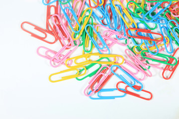 Closed-up paper clips background with empty space