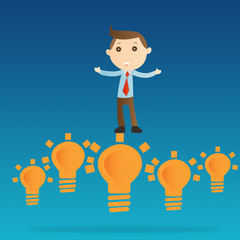 Businessman with bulb light on blue background